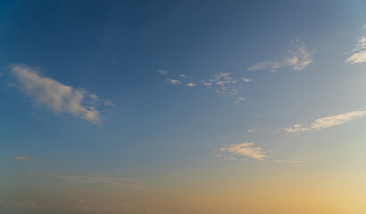 Fototapeta premium Morning sky with orange sunrise clouds and blue sky background 