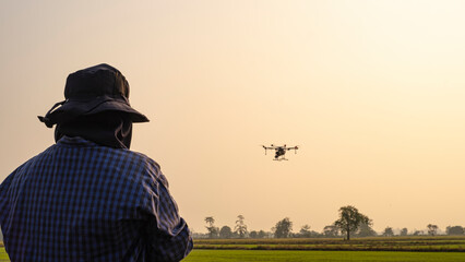 Agricultural drone pilot is a new innovation that farmers in Thailand enjoy using chemicals.