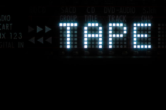 Old vacuum fluorescent display. TAPE sign