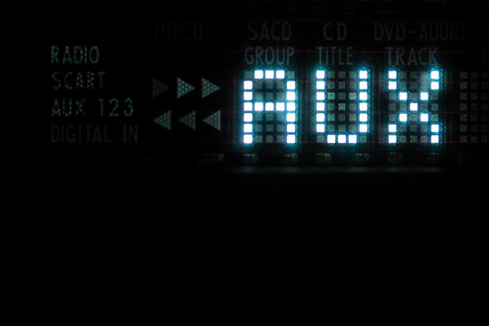 Old vacuum fluorescent display. AUX sign