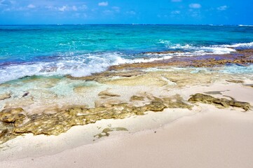 Caribbean coral reef and island beach