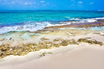 Caribbean coral reef and island beach