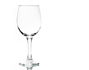 Outline of an empty wine glass on a white background. Transparency created by a silhouette.