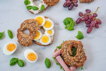 freshly baked whole grain bagels. heap of fresh baked bagels