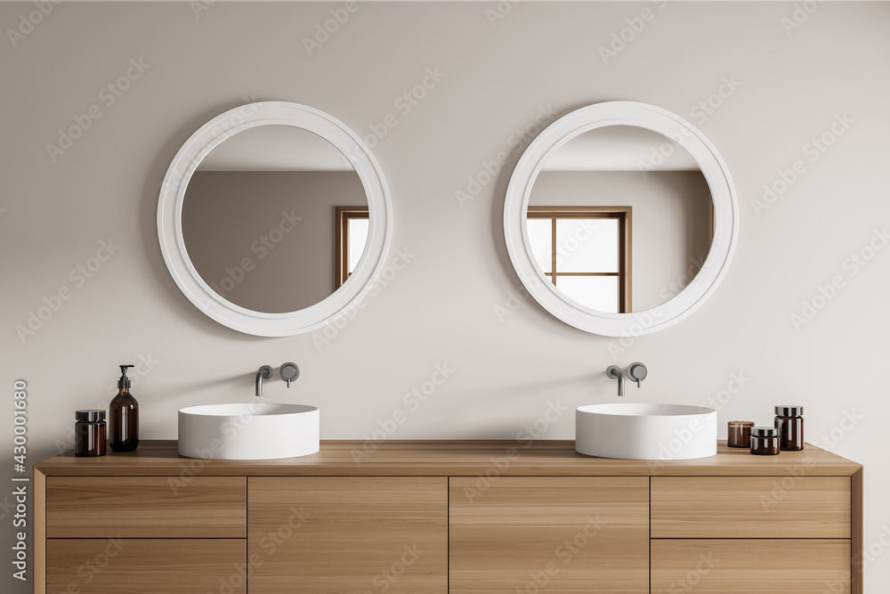 Wall mural light bathroom interior with two sinks and bath accessories