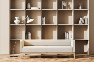 Living room interior with large bookcase and beige sofa