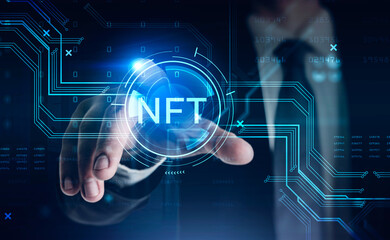 Businessman in suit touching non-fungible token hologram on virtual screen, nft with network circuit and globe. Concept of crypto art and technology