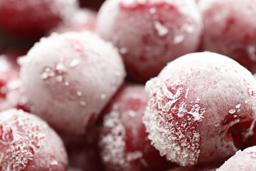 Macro of frozen berries - sweet cherries, closeup, background texture, food storage, saving leftovers, healthy organic food concept