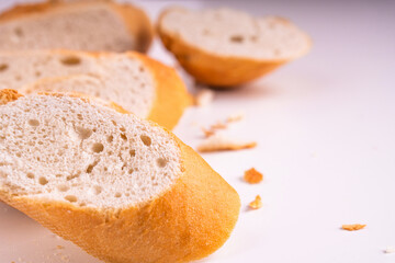 Isolated clipping path white background of organic flour mixed gold brown bread homemade baked italian ciabatta french toast baguette whole wheat rye oat loaf with healthy seed gluten free