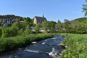 view of the river in the village of the mountains