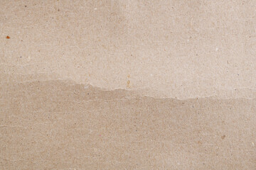Fototapeta na wymiar Texture of old organic cardboard, beige paper, background for design, copy space. Recyclable material, has inclusions of cellulose