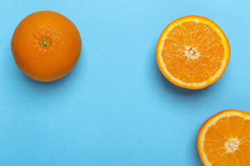 Orange fruit or orange on a blue background.