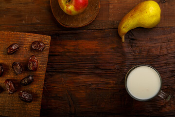 Iftar food for Ramadan fasting dates, fruits and milk ayran.