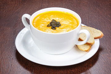 Tasty pumpkin soup with seeds