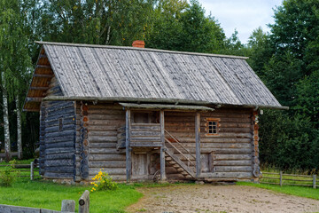 Wooden two-storey log house.
