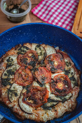 Closeup of a pan-made vegetable pizza