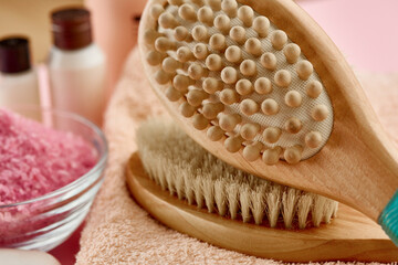 Different skin care products, pink background