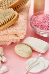 Body care products on pink
