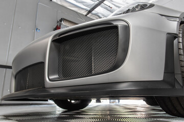 Air intake vents on the front of this sports car takes advantage of the natural cooling features of...