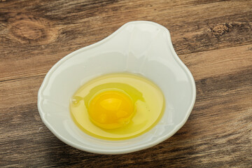 Raw Chicken egg in the bowl