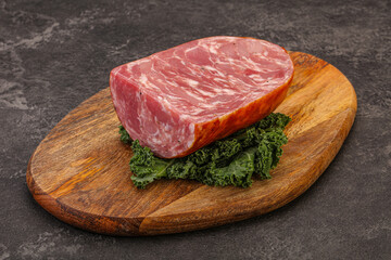 Beef ham piece over board