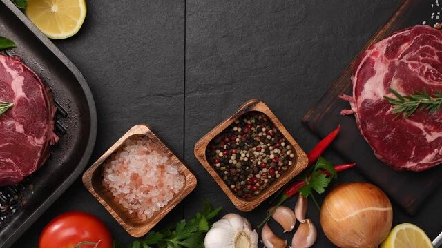 Fresh raw pieces of beef meat on a cutting board