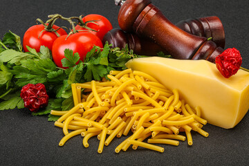 Italian pasta raw Maccheroni for cooking