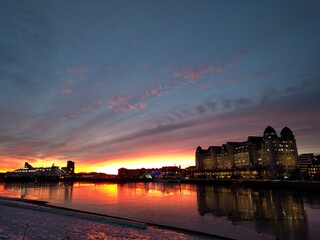 sunset in the harbor with view over the sea