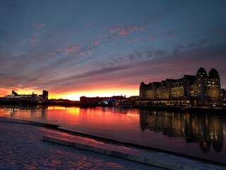 sunset in the harbor with view over the sea