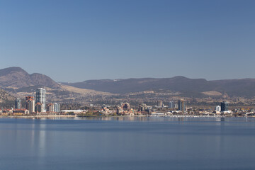 Fototapeta na wymiar View of downtown of Kelowna across from the west side of the Okanagan Lake