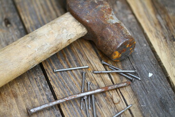 Old construction tools on the wooden floor