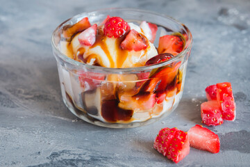 Yogurt ice cream with strawberry with candy
