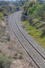 Obraz na płótnie Canvas View of railroad rails with rails and catenary