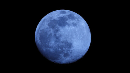 Zoom photo of full moon as seen at night