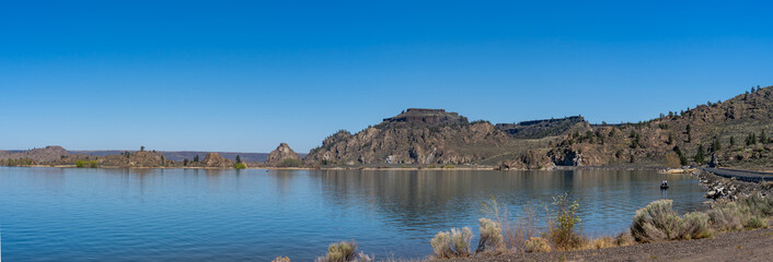 Northrup Point WA USA - 04-17-2021: Panorama of Banks Lake with Fishing and Cliffs in Background