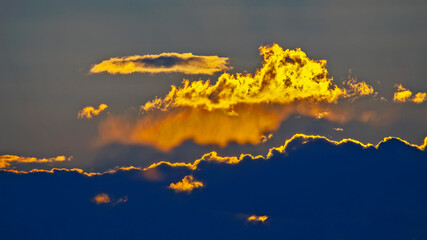 the expressive contrast of the clouds in the sky and sun. The nature and beauty of clouds