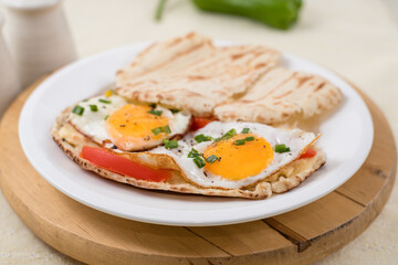 sunny side up eggs with pita bread