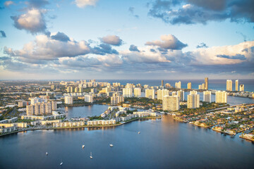 Fototapeta na wymiar Helicopter view of Miami Beach skyline with water and buildings