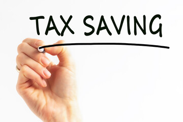 hand writing inscription tax saving with marker, concept, stock image