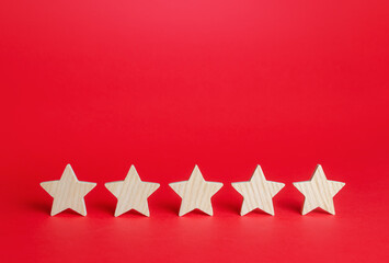 Five stars on a red background. Rating evaluation concept. Service quality feedback. High...