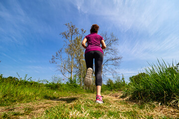 Jogging scene in a natural parkland