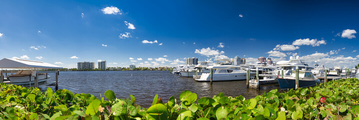 Fototapeta na wymiar West Palm Beach panoramic view of city port and boats on a sunny winter day, Florida