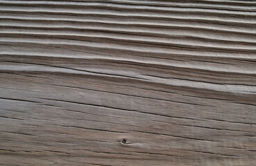 Obraz premium Textura de madeira velha e ressequida com odulações e relevos fortes