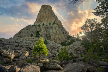 Sunrise peaking through from the Tower Trail at Devils Tower National Monument - Wyoming 