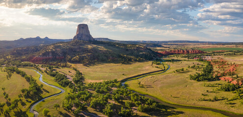 Panorama view of setting sun at Devils Tower National Monument with the red cliffs - Wyoming  © Craig Zerbe