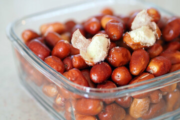 large amount of ripe oleaster fruits, oleaster fruits in a glass bowl,