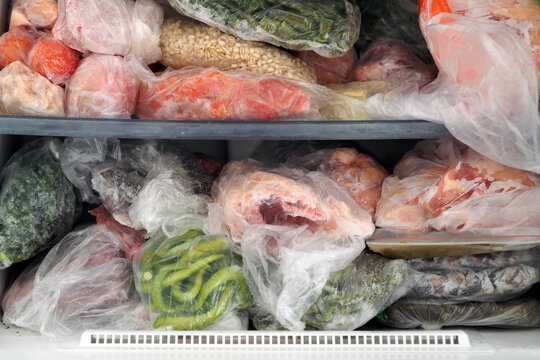 frozen foods, frozen vegetables and meats in the freezer,