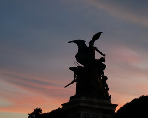 Fototapeta premium Silhouette of Rome against the background of a beautiful, red sunset 