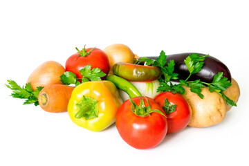 Photo of a still-life from fresh vegetables on a white background