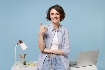 Young successful employee business woman in casual shirt work stand at white office desk with pc...